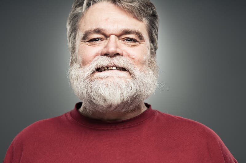 Mature Caucasian Man Laughing And Looking Away royalty free stock photography