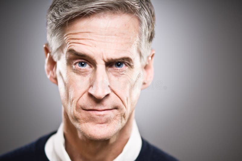 Mature Caucasian Man With Raised Eyebrow Portrait stock photos