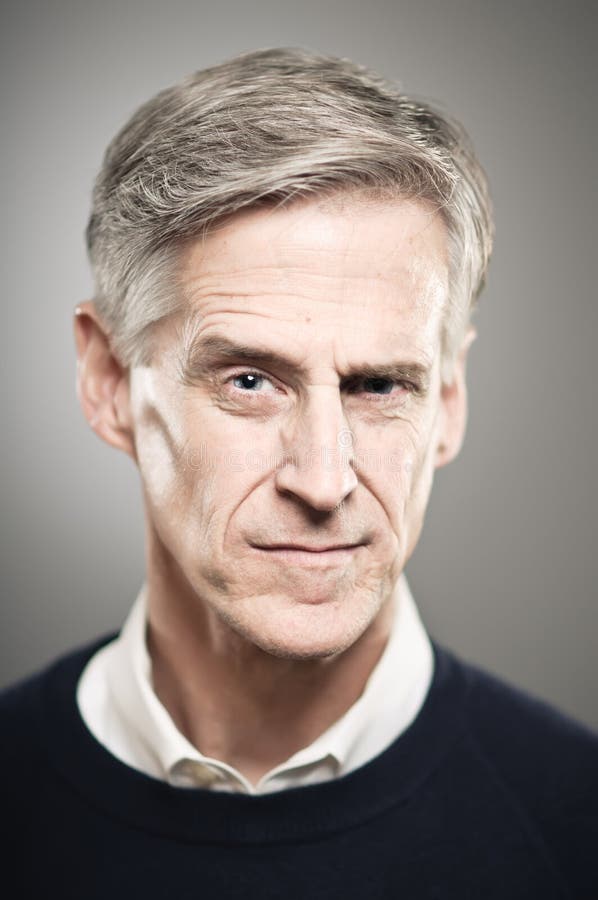 Mature Caucasian Man With Raised Eyebrow Portrait stock photos