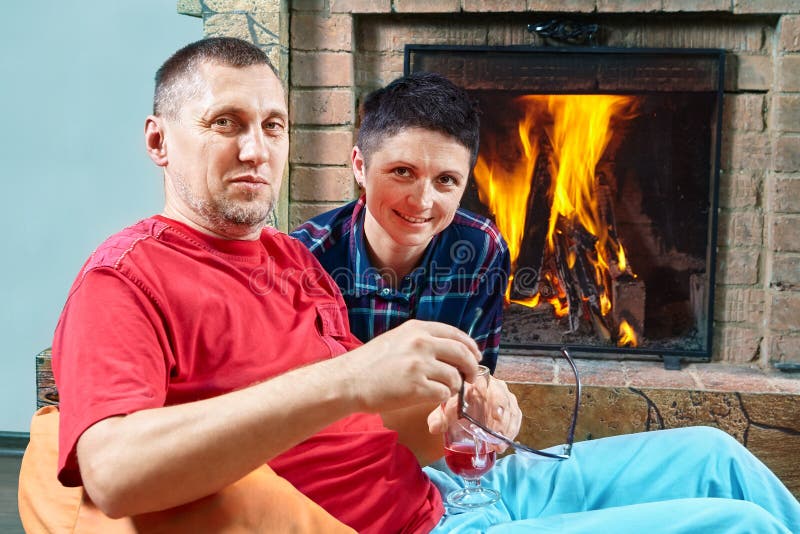 Mature Couple Are Siting Near Fireplace Stock Image Image Of Consent Friendship 166473531