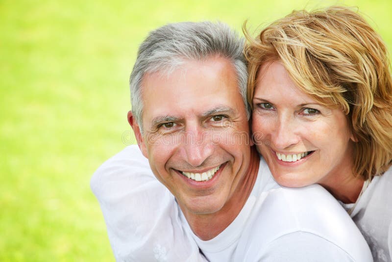Mature couple smiling royalty free stock photography