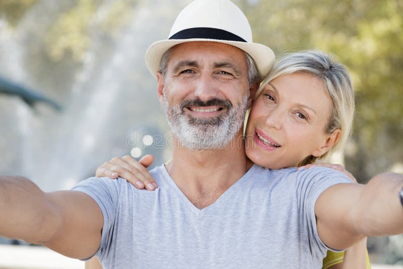 Mature Couple Taking Selfie Outdoors With Smart Phone Stock Image Image Of Twopeople Together 