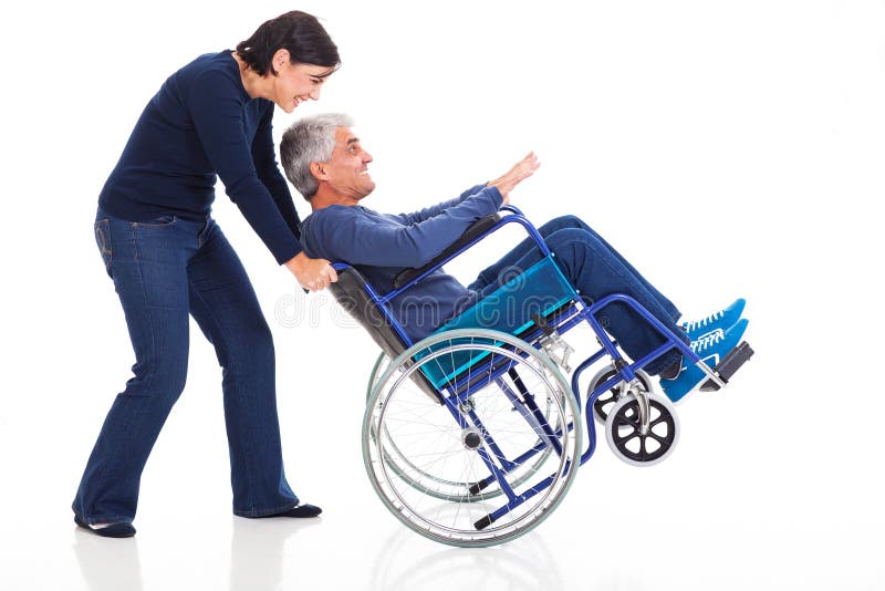 Mature couple wheelchair stock photo