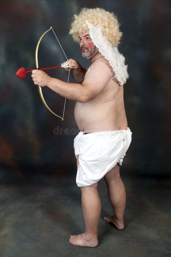 Photo of funky mature man cupid amour hold paper heart shape postcard hide half face flirty coquettish mood wear hearts