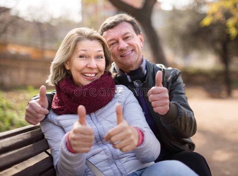 Mature family couple staying outdoor royalty free stock photography Mature family couple staying outdoor royalty free stock photography