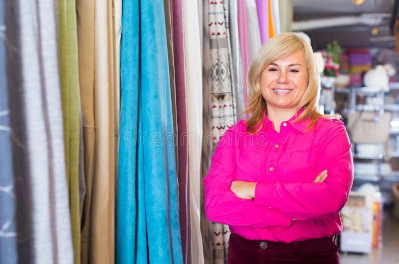 Mature Female Standing in the Curtains Store Stock Photo - Image of ...