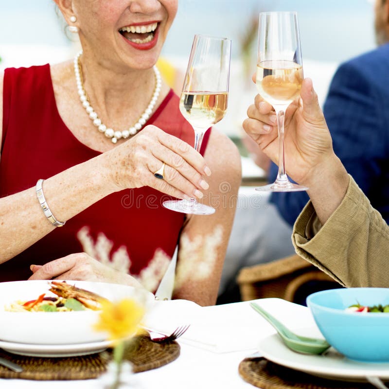 Mature Friends Fine Dining Outdoors Concept