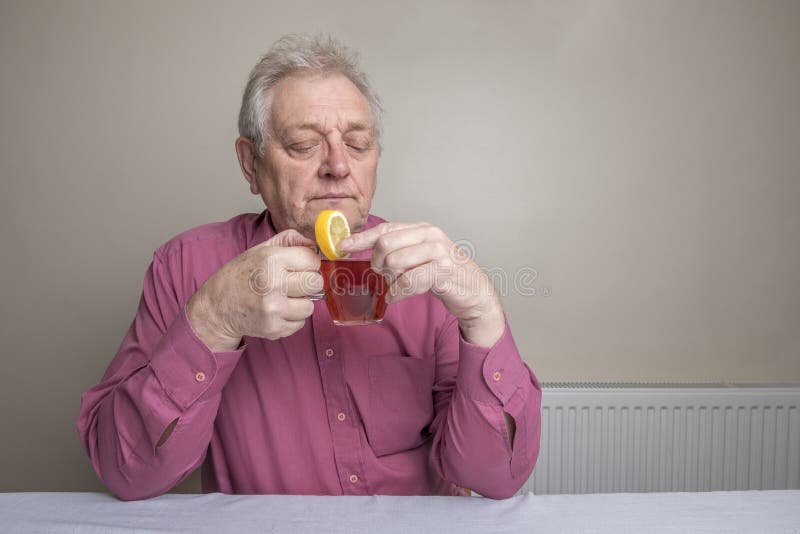 Mature Man Drinking Honey, Lemon with Hot Water Stock Photo Image of
