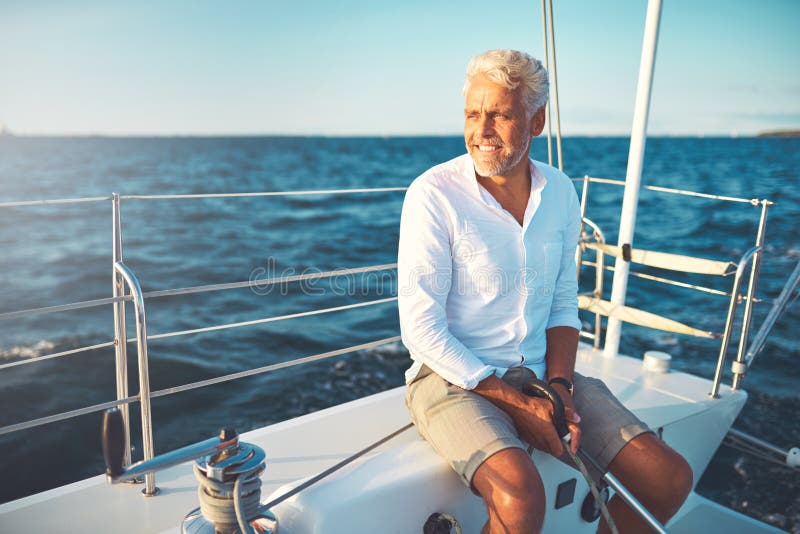 white man on yacht