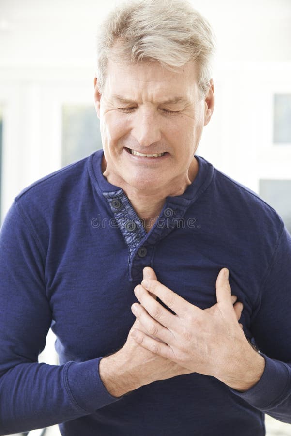 Mature Man Suffering Heart at Home Stock Image - Image of male ...