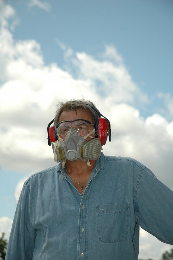 Mature Man wearing safety gear.