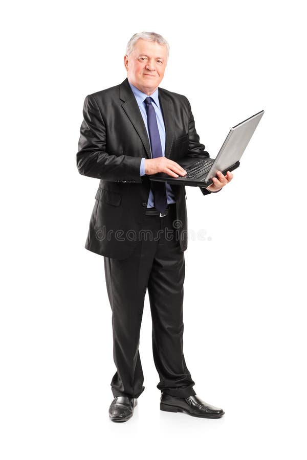 Mature manager working on a laptop royalty free stock images