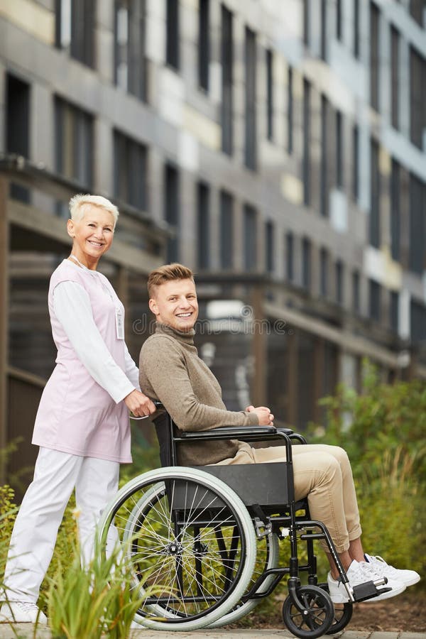 Mature Nurse Working With Recovering Patient Stock Photo Image Of