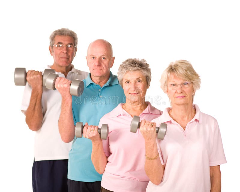 Group of older mature people lifting weights in the gym. Group of older mature people lifting weights in the gym
