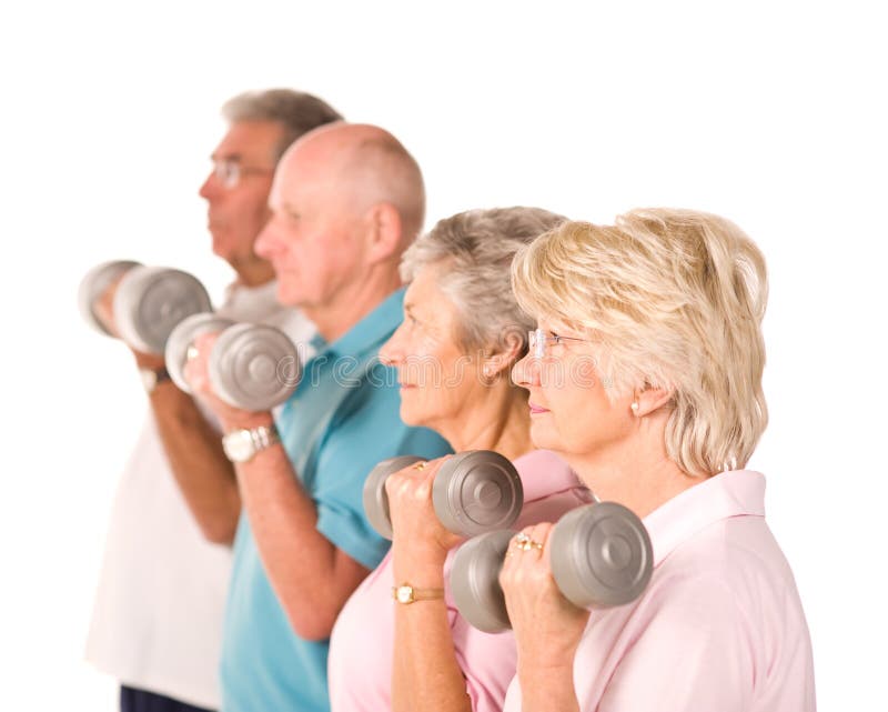 Group of older mature people lifting weights in the gym. Group of older mature people lifting weights in the gym