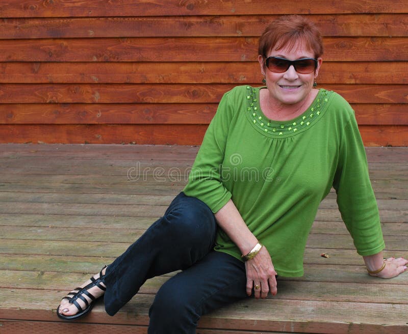 Mature redhead beauty. stock photo. Image of active, outdoors 17283160