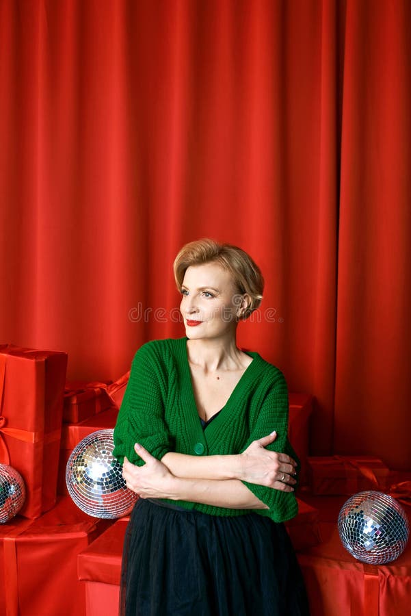 Mature Stylish Elegant Woman in Cocktail Dress with Glass of