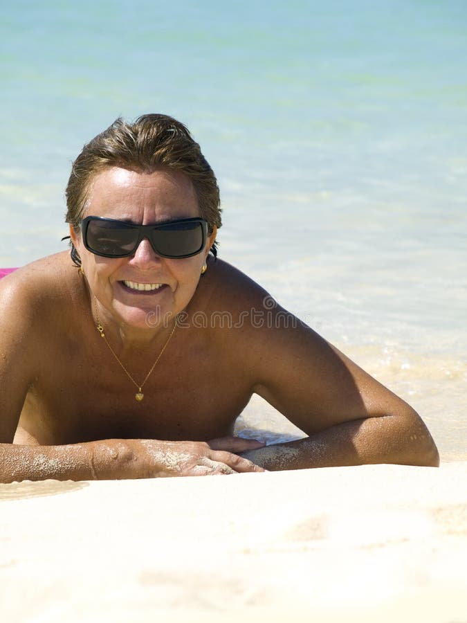Mature Women Topless At Beach Stock Photos - Free & Royalty-Free Stock