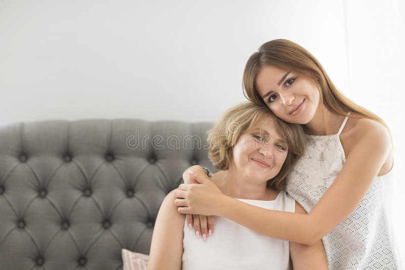 A Mature Woman with a Young Girl.