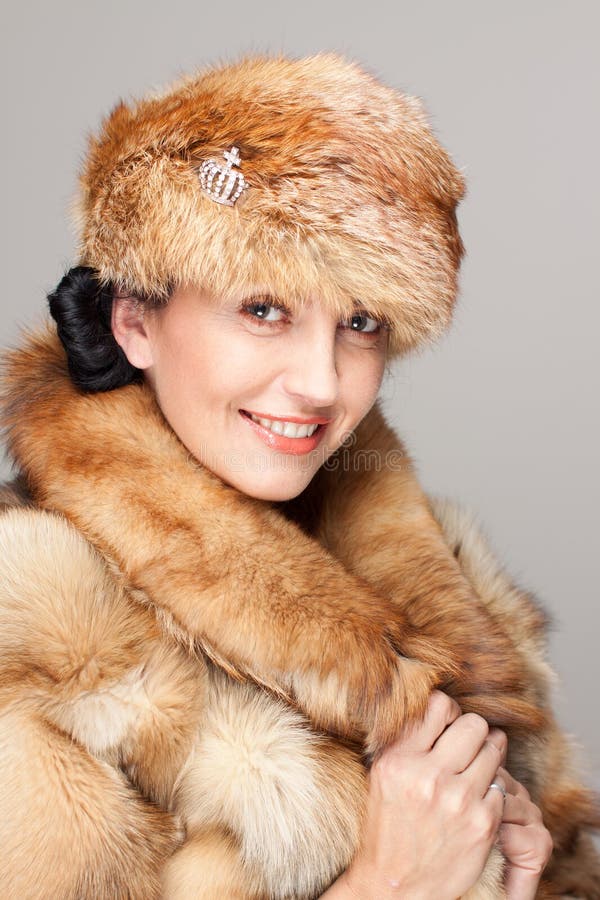 Mature woman in fur hat portrait