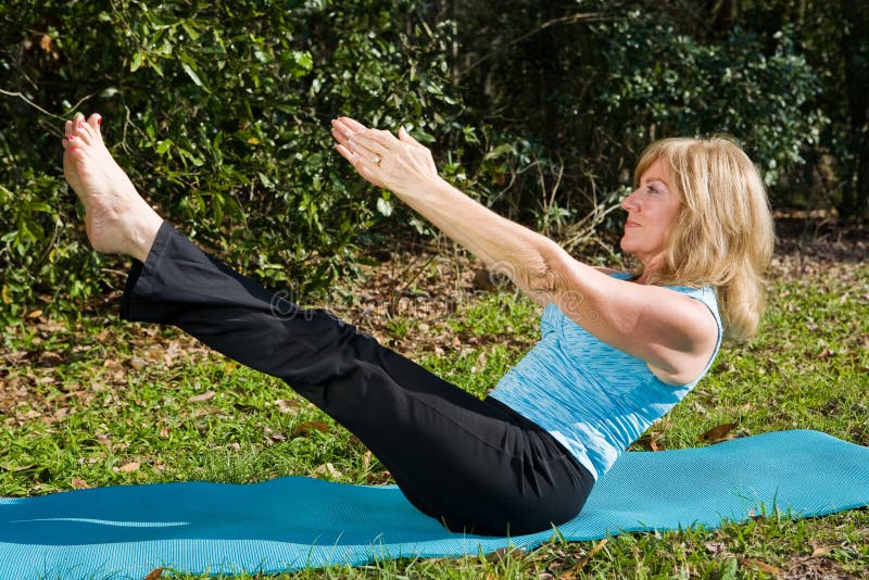 Mature Woman Pilates stock photo. Image of senior, nature 4989902