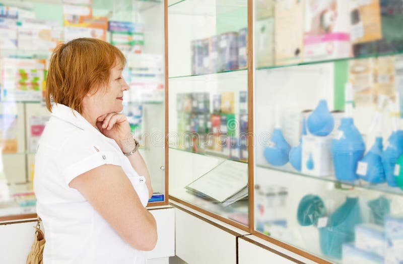 Mature woman r in pharmacy