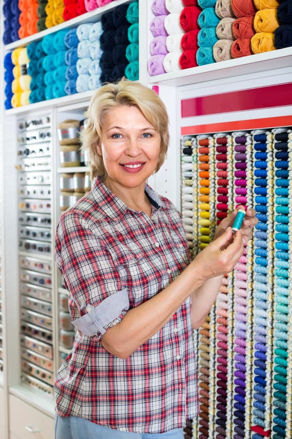 Mature Woman in Sewing Store. Stock Image Image of shop, supplies