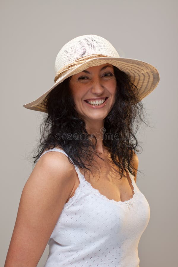 Mature woman in a straw hat