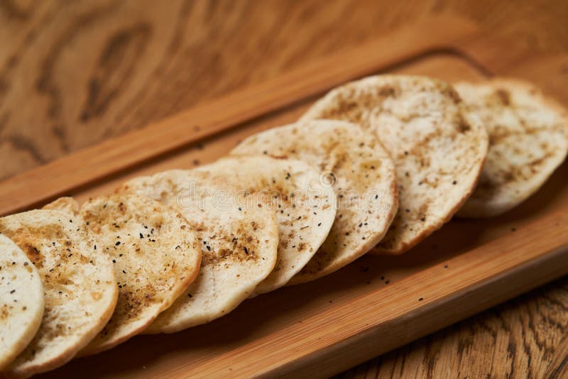 Matzah - Jewish traditional Passover bread on wooden table stock images Matzah - Jewish traditional Passover bread on wooden table stock images