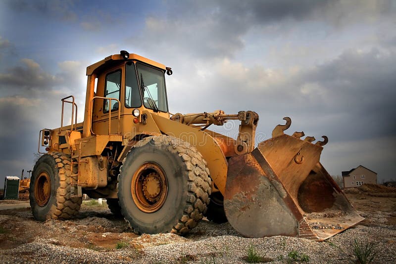 Construction equipment with sky back ground on a new housing site. Construction equipment with sky back ground on a new housing site