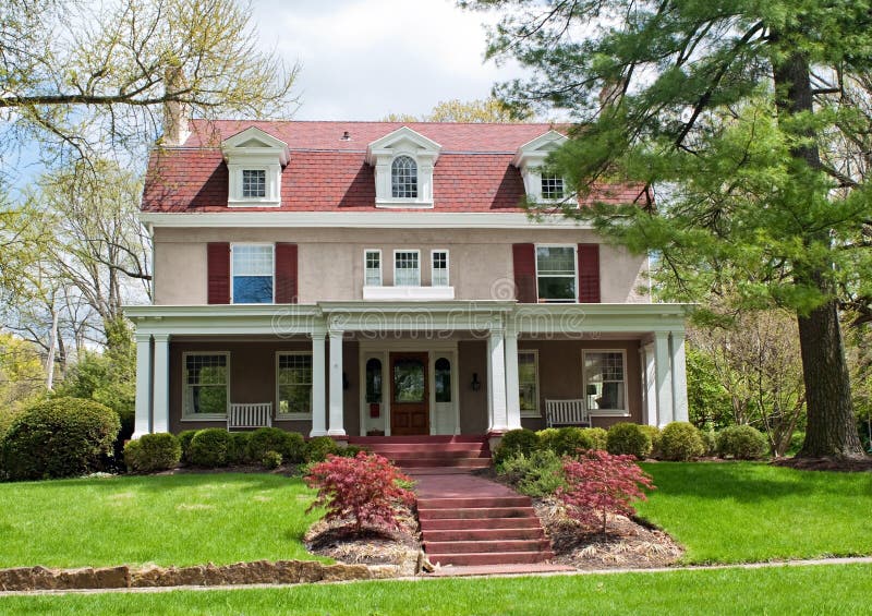 Mauve Stucco House with Burgundy Accents