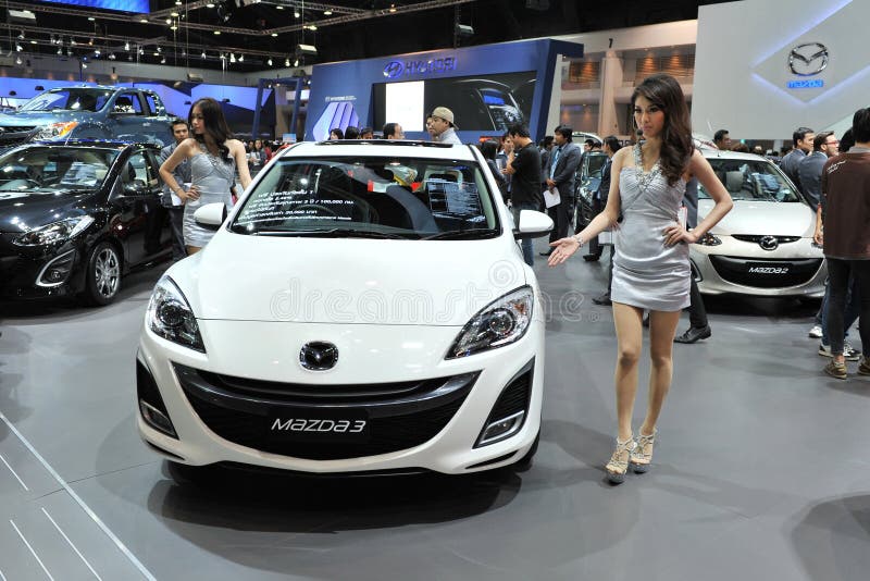 Mazda 3 sur l'affichage à un Salon de l'Automobile photographie stock Mazda 3 sur l'affichage à un Salon de l'Automobile photographie stock