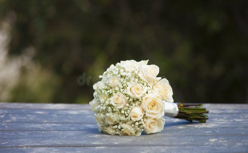 Bouquet of wedding roses for outdoor wedding. Bouquet of wedding roses for outdoor wedding