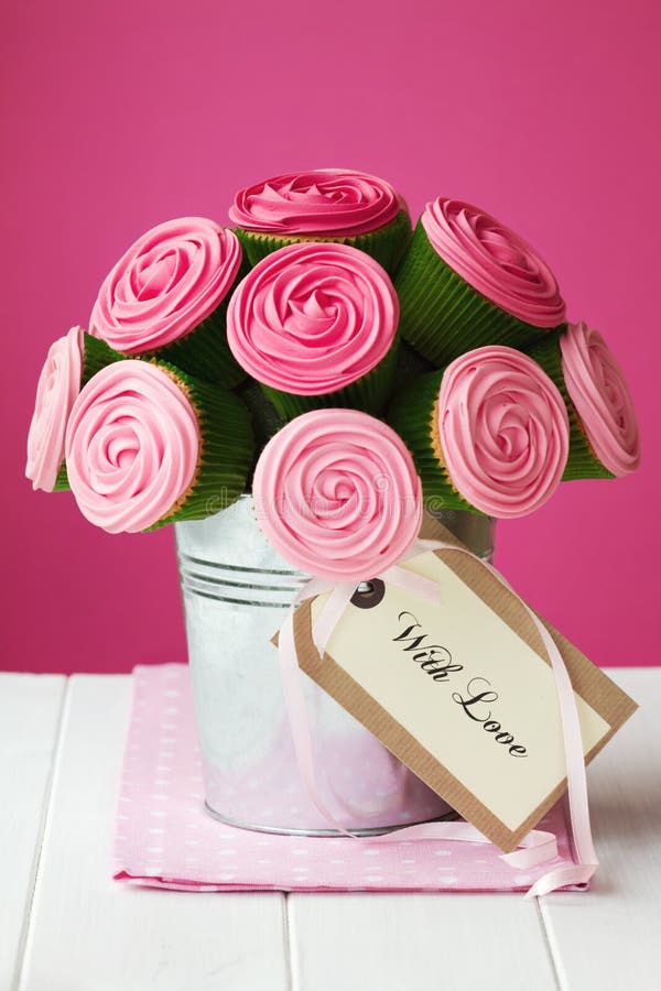 Bouquet of rose cupcakes with gift tag. Bouquet of rose cupcakes with gift tag