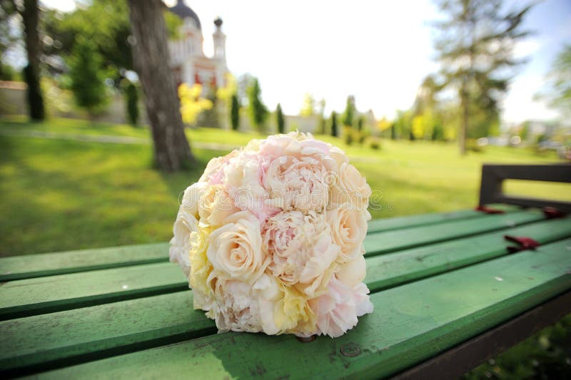 Wedding bouquet of pastel roses and peonies. Wedding bouquet of pastel roses and peonies