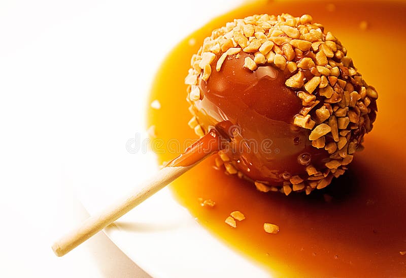 Caramel apple with nuts. Caramel apple with nuts