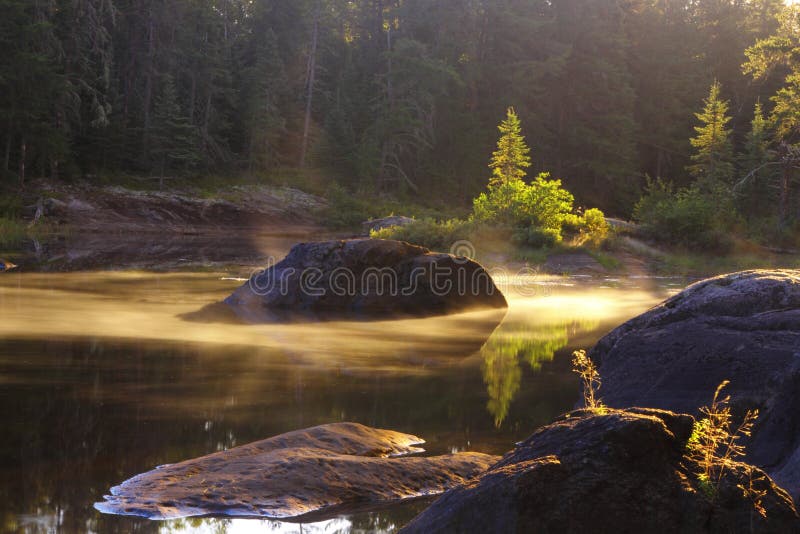 Beautiful foggy lake in a remote wilderness of Minnesota, USA. Beautiful foggy lake in a remote wilderness of Minnesota, USA