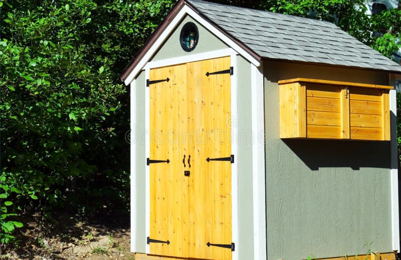 A shed for storage of gardening tools. A shed for storage of gardening tools.