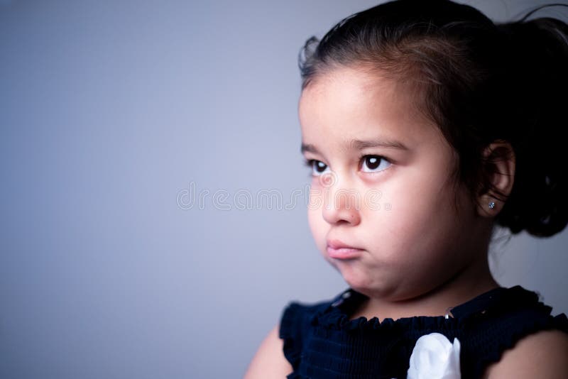 Little  Asian cute  Girl child sad or  with crying face at home, Effect of Corona virus home lock down on kids feel sad and helpless . Little  Asian cute  Girl child sad or  with crying face at home, Effect of Corona virus home lock down on kids feel sad and helpless .