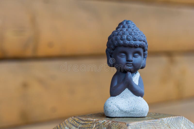 Little Buddha statue image used as amulets of Buddhism religion. Meditation concept with empty space for text. Little Buddha statue image used as amulets of Buddhism religion. Meditation concept with empty space for text.