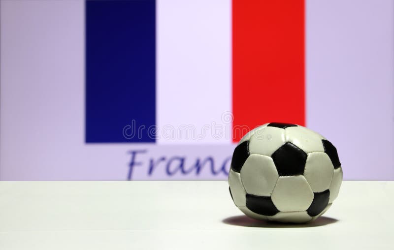 Mały futbol na białej podłoga i out skupia się Tri kolor lub błękitnego kolor Francuski naród flaga tło z Francja białego i czerw fotografia stock Mały futbol na białej podłoga i out skupia się Tri kolor lub błękitnego kolor Francuski naród flaga tło z Francja białego i czerw fotografia stock