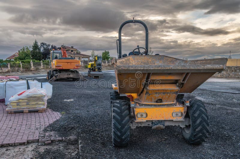 Small dumper at a road construction site. Small dumper at a road construction site.