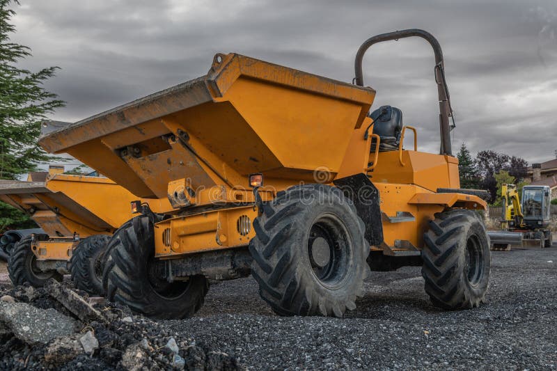 Small dumper at a road construction site. Small dumper at a road construction site.