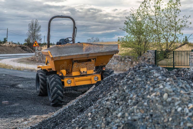 Small dumper at a road construction site. Small dumper at a road construction site.