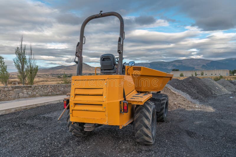 Small dumper at a road construction site. Small dumper at a road construction site.