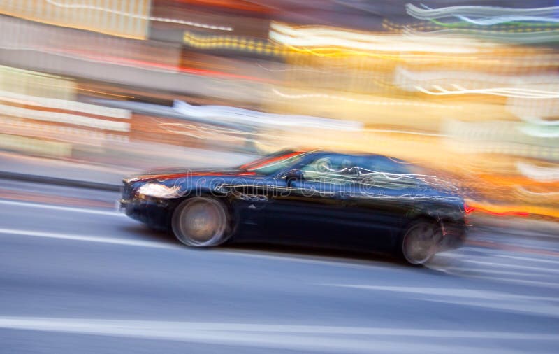 Mașină sport în mișcare albastră stock photos