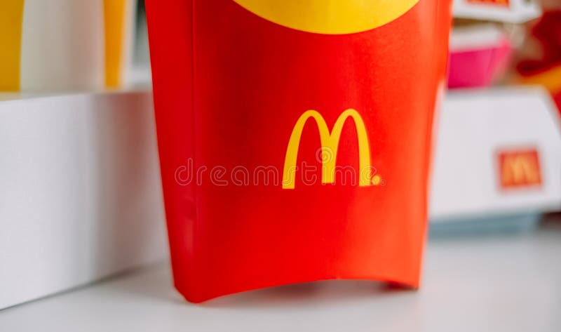 McDonald`s logo on company production boxes. Close up