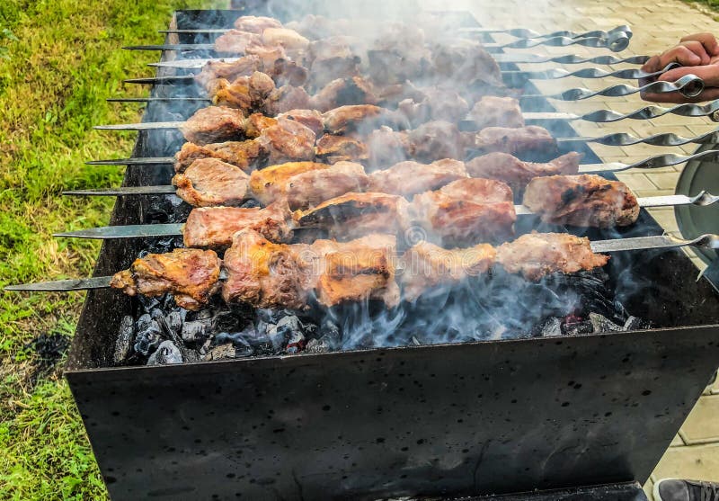 Mcvadi - Shashlik Preparing On A Barbecue Grill Over Charcoal. Roasted ...