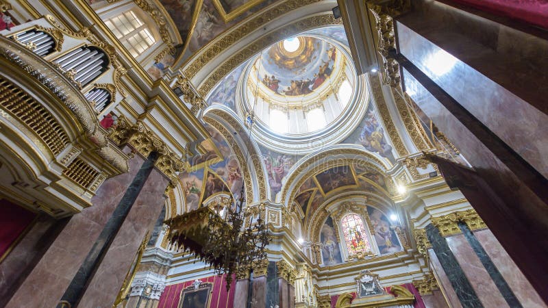 Interiors of St Pauls Cathedral D. Mdina, Malta - July 5, 2018: Interiors of St Pauls Cathedral D, Build 1696-1705, the country`s oldest church royalty free stock photos Interiors of St Pauls Cathedral D. Mdina, Malta - July 5, 2018: Interiors of St Pauls Cathedral D, Build 1696-1705, the country`s oldest church royalty free stock photos