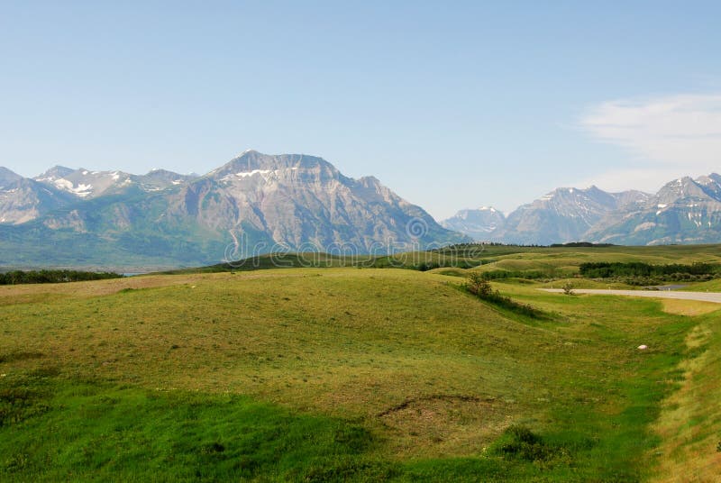 Meadows to mountains stock photos
